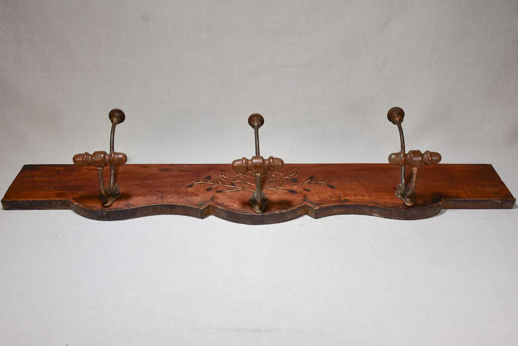 Salvaged 19th Century coat rack with olive tree marquetry 44"